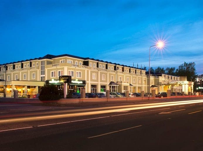 Clanree Hotel from the road at dusk.